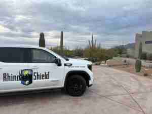 Rhino Shield Truck At A Home