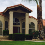 Two-Story Stucco Home With Rhino Shield Exterior Coating.