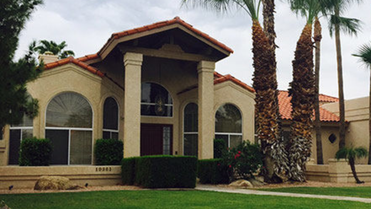 Two-Story Stucco Home With Rhino Shield Exterior Coating.
