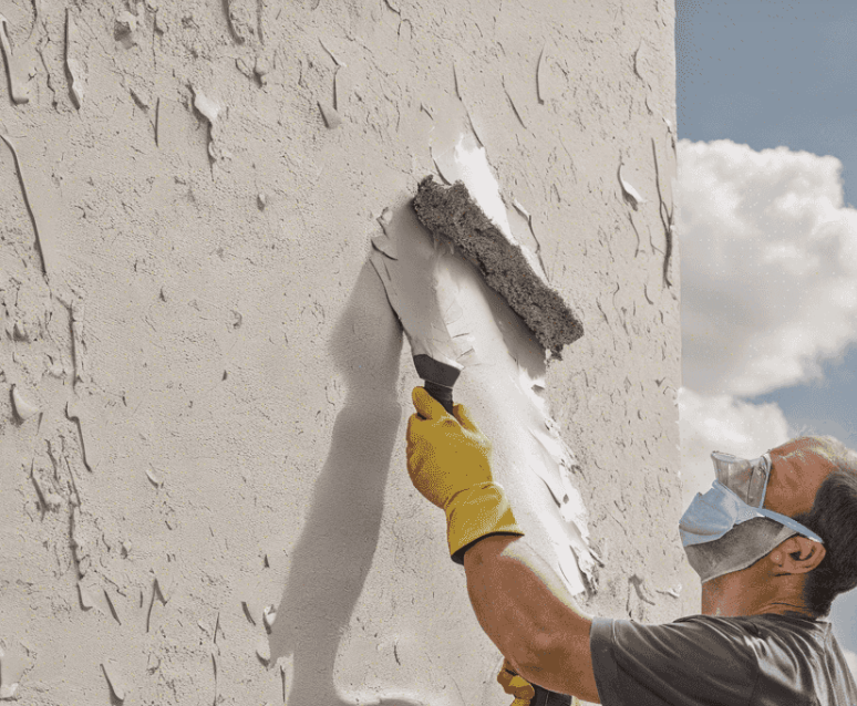 Scraping Loose Stucco Material In Scottsdale Az